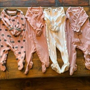 Lot of 4 loved baby footed onesies